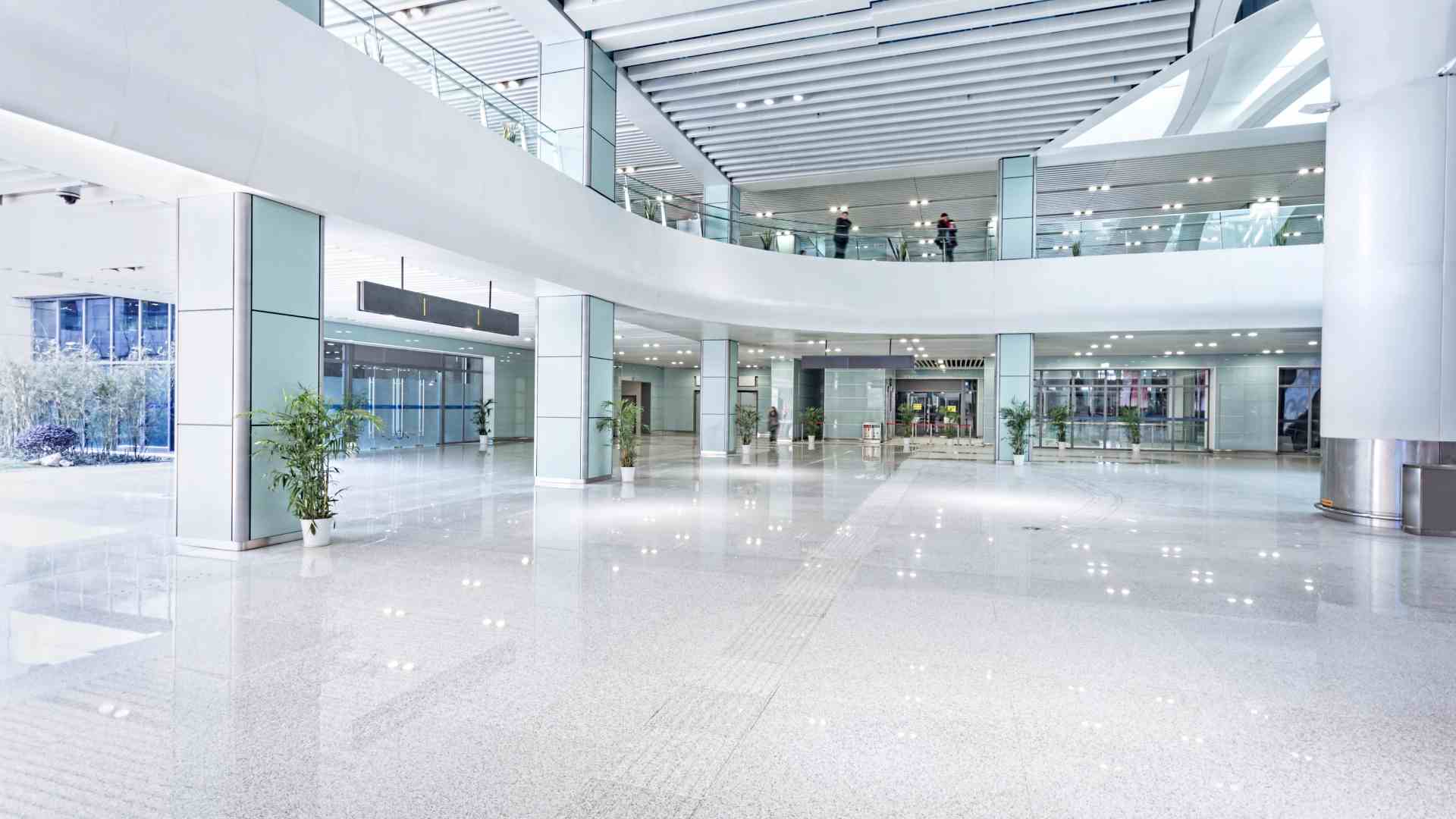 white concrete flooring in a mall or inside a building by crete rite